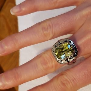 Sterling silver size 7 ring with light green stone